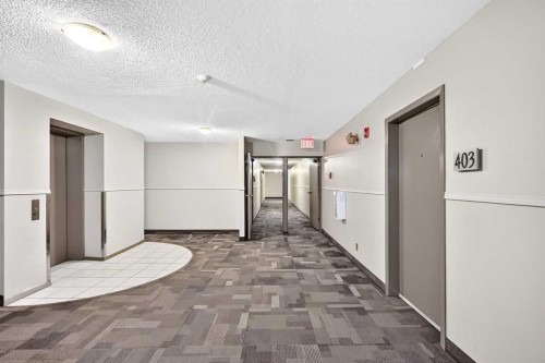 403-647 1 Avenue Ne, Calgary, AB - Indoor Photo Showing Other Room