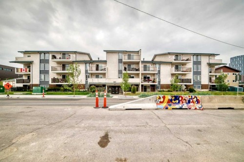 403-647 1 Avenue Ne, Calgary, AB - Outdoor With Balcony With Facade