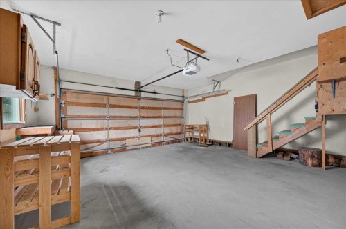 714 9 Avenue Se, High River, AB - Indoor Photo Showing Garage
