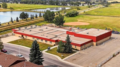714 9 Avenue Se, High River, AB - Outdoor With Body Of Water