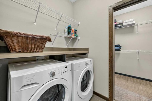 23 Cranarch Landing Se, Calgary, AB - Indoor Photo Showing Laundry Room