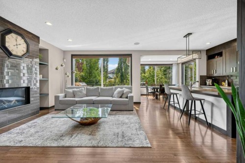 23 Cranarch Landing Se, Calgary, AB - Indoor Photo Showing Living Room With Fireplace