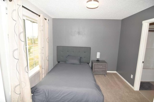 43 Kinlea Common Nw, Calgary, AB - Indoor Photo Showing Bedroom