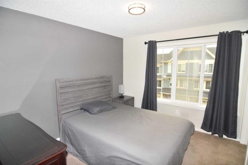 43 Kinlea Common Nw, Calgary, AB - Indoor Photo Showing Bedroom