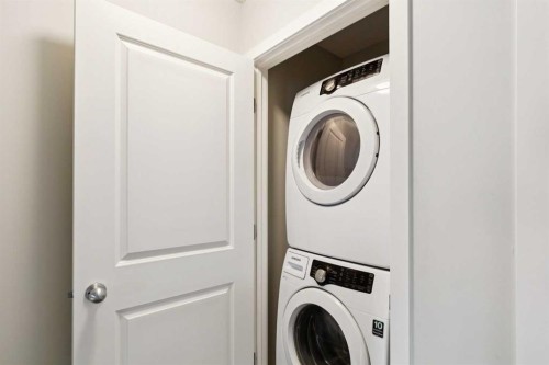 43 Kinlea Common Nw, Calgary, AB - Indoor Photo Showing Laundry Room