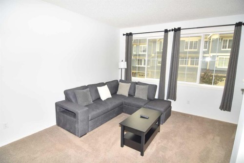 43 Kinlea Common Nw, Calgary, AB - Indoor Photo Showing Living Room