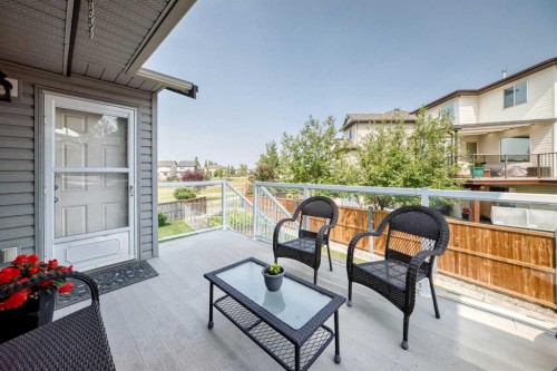 325 Luxstone Green Sw, Airdrie, AB - Outdoor With Deck Patio Veranda With Exterior