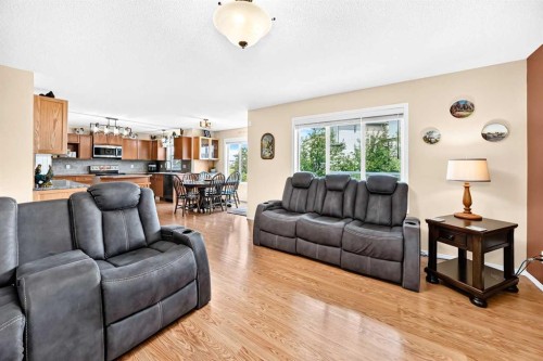 325 Luxstone Green Sw, Airdrie, AB - Indoor Photo Showing Living Room