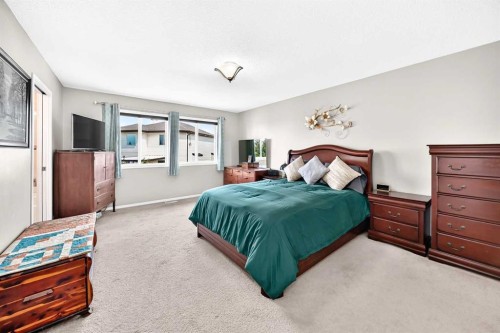 325 Luxstone Green Sw, Airdrie, AB - Indoor Photo Showing Bedroom