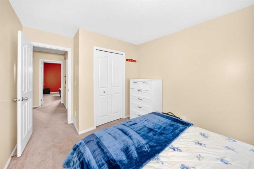 325 Luxstone Green Sw, Airdrie, AB - Indoor Photo Showing Bedroom