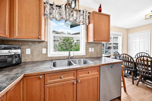 325 Luxstone Green Sw, Airdrie, AB - Indoor Photo Showing Kitchen With Double Sink