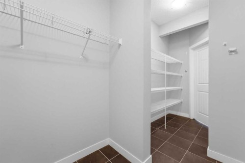 174 Morningside Circle Sw, Airdrie, AB - Indoor With Storage