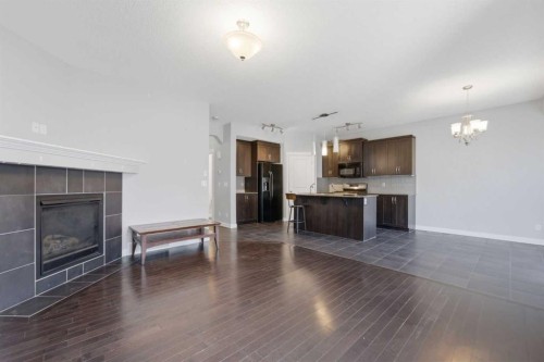 174 Morningside Circle Sw, Airdrie, AB - Indoor With Fireplace