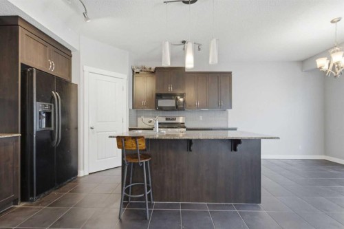 174 Morningside Circle Sw, Airdrie, AB - Indoor Photo Showing Kitchen