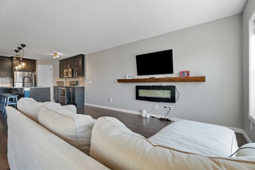 139 Auburn Meadows Place Se, Calgary, AB - Indoor Photo Showing Living Room With Fireplace