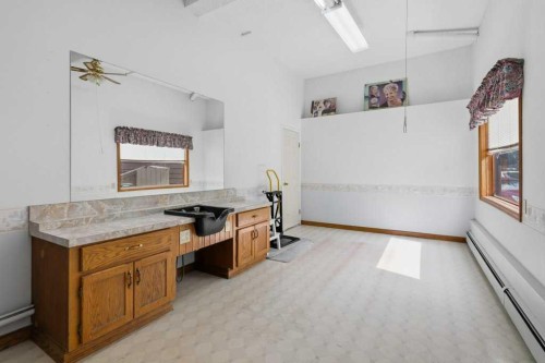 119 Strathbury Bay Sw, Calgary, AB - Indoor Photo Showing Other Room