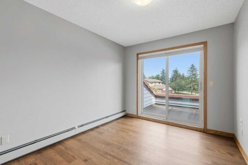 119 Strathbury Bay Sw, Calgary, AB - Indoor Photo Showing Other Room