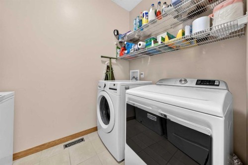 37 Scimitar Heath Nw, Calgary, AB - Indoor Photo Showing Laundry Room