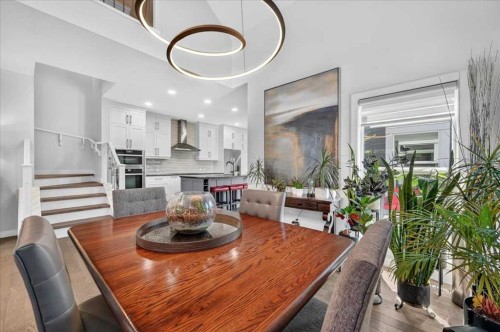 9 Drake Landing Square, Okotoks, AB - Indoor Photo Showing Dining Room