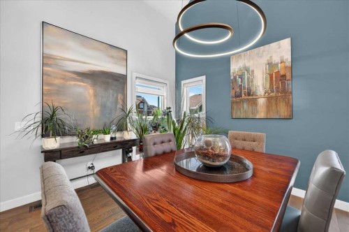 9 Drake Landing Square, Okotoks, AB - Indoor Photo Showing Dining Room
