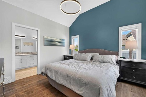 9 Drake Landing Square, Okotoks, AB - Indoor Photo Showing Bedroom