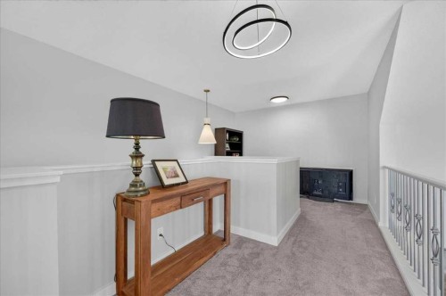 9 Drake Landing Square, Okotoks, AB - Indoor Photo Showing Other Room