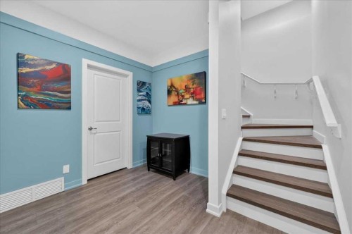 9 Drake Landing Square, Okotoks, AB - Indoor Photo Showing Other Room