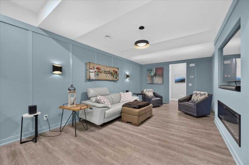 9 Drake Landing Square, Okotoks, AB - Indoor Photo Showing Living Room
