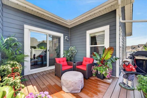 9 Drake Landing Square, Okotoks, AB - Outdoor With Deck Patio Veranda