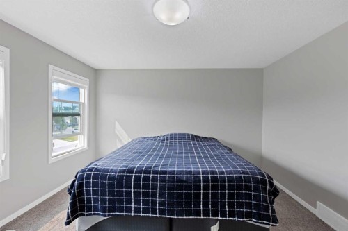 256 Auburn Glen Close Se, Calgary, AB - Indoor Photo Showing Bedroom