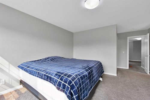 256 Auburn Glen Close Se, Calgary, AB - Indoor Photo Showing Bedroom