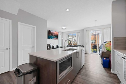 256 Auburn Glen Close Se, Calgary, AB - Indoor Photo Showing Kitchen With Double Sink