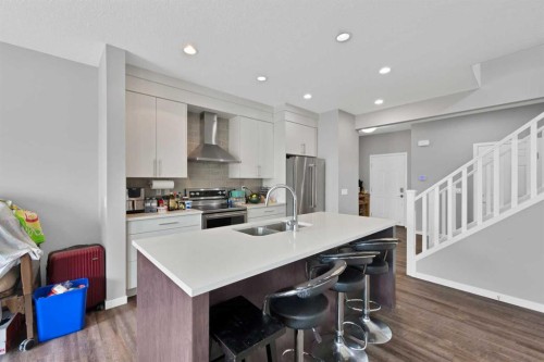 256 Auburn Glen Close Se, Calgary, AB - Indoor Photo Showing Kitchen With Double Sink With Upgraded Kitchen