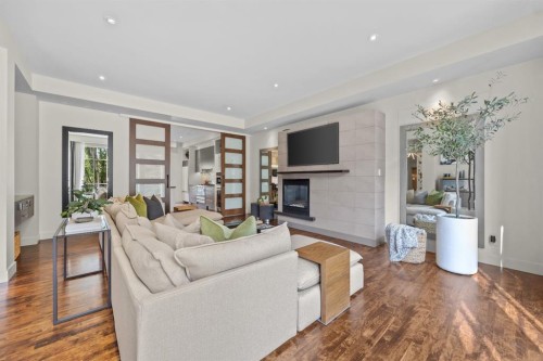 1143 Sifton Boulevard Sw, Calgary, AB - Indoor Photo Showing Living Room With Fireplace