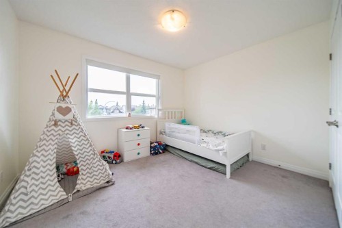83 Auburn Glen Lane Se, Calgary, AB - Indoor Photo Showing Bedroom