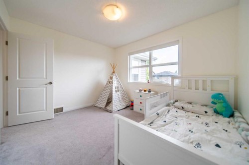 83 Auburn Glen Lane Se, Calgary, AB - Indoor Photo Showing Bedroom