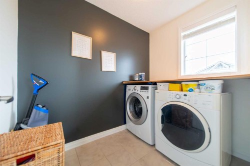 83 Auburn Glen Lane Se, Calgary, AB - Indoor Photo Showing Laundry Room