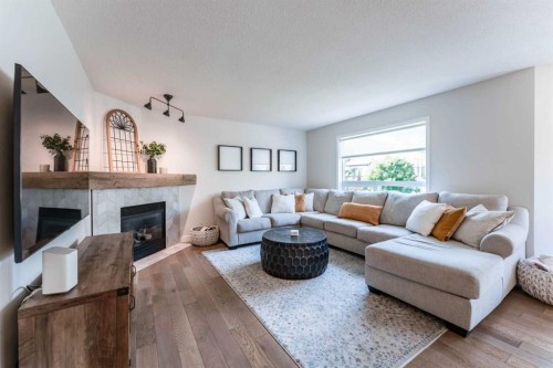 240 Willowmere Close, Chestermere, AB - Indoor Photo Showing Living Room With Fireplace