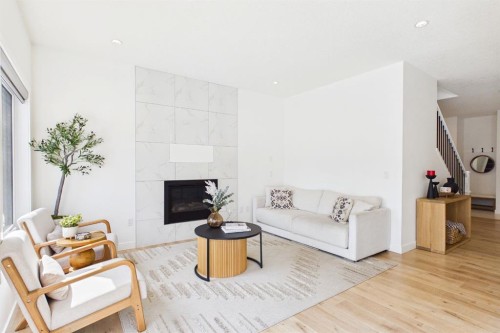 66 Legacy Glen Crescent Se, Calgary, AB - Indoor Photo Showing Living Room With Fireplace