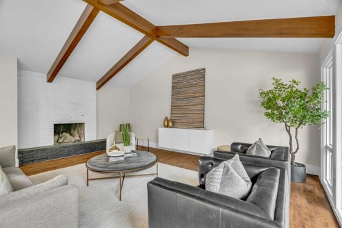 60 Massey Place Sw, Calgary, AB - Indoor Photo Showing Living Room With Fireplace