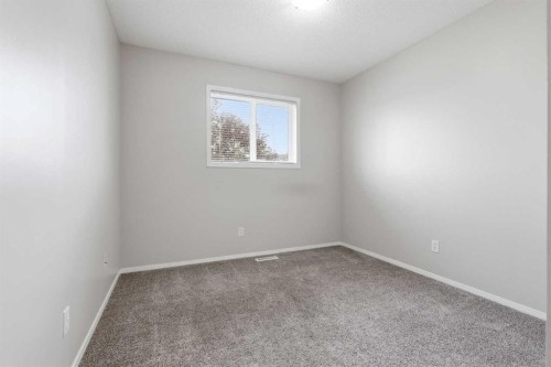 103-760 Railway Gate Sw, Airdrie, AB - Indoor Photo Showing Other Room