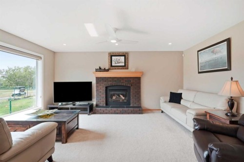 122 Douglas Woods Hill Se, Calgary, AB - Indoor Photo Showing Living Room With Fireplace