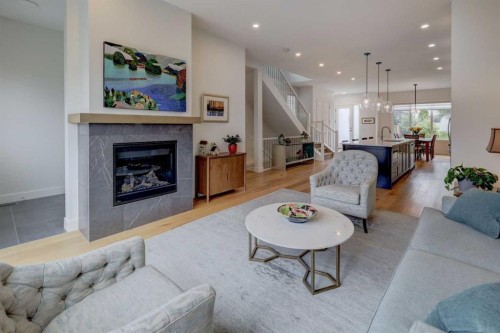 3337 41 Street Sw, Calgary, AB - Indoor Photo Showing Living Room With Fireplace