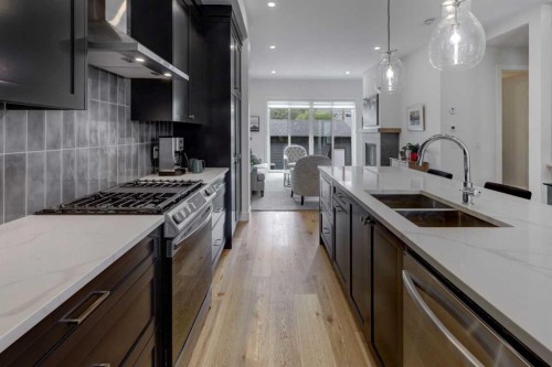 3337 41 Street Sw, Calgary, AB - Indoor Photo Showing Kitchen With Stainless Steel Kitchen With Double Sink With Upgraded Kitchen