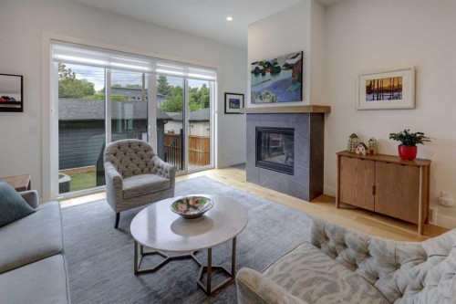 3337 41 Street Sw, Calgary, AB - Indoor Photo Showing Living Room With Fireplace