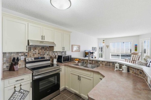 159 Applebrook Circle Se, Calgary, AB - Indoor Photo Showing Kitchen With Double Sink