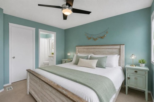 377 Tuscany Valley View Nw, Calgary, AB - Indoor Photo Showing Bedroom