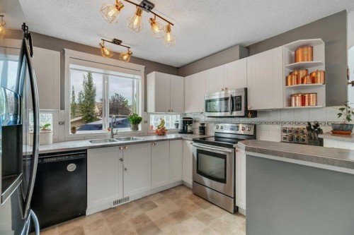 377 Tuscany Valley View Nw, Calgary, AB - Indoor Photo Showing Kitchen With Stainless Steel Kitchen With Double Sink