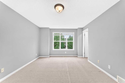 133 Prestwick Heights Se, Calgary, AB - Indoor Photo Showing Other Room