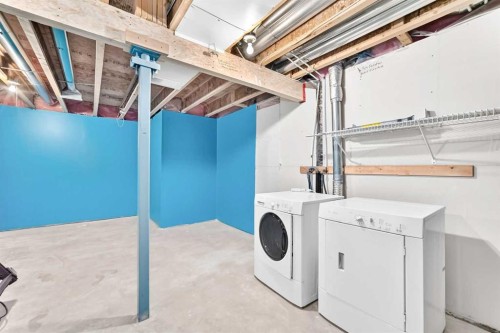 133 Prestwick Heights Se, Calgary, AB - Indoor Photo Showing Laundry Room